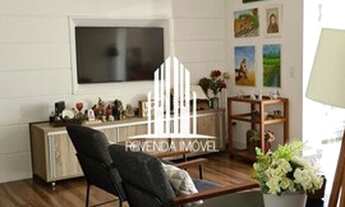 Imagem 2: Aconchegante apartamento com 3 quartos, sendo 1 suíte, e 3 banheiros no total. Este aparta