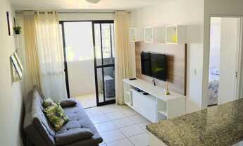 Imagem 2: Quarto e sala totalmente mobiliado próximo a praia