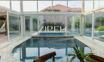 Imagem: CASA À VENDA COM PISCINA E 5 SUÍTES AO