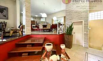 Imagem 4: Casa de condomínio para venda possui 550 metros quadrados com 4 quartos