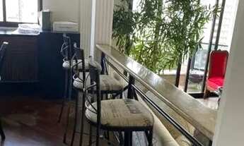 Imagem 2: Excelente apartamento de 170m² com uma ampla sala e varanda com uma linda vista