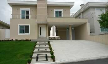 Imagem 1: Casa de 624m2 Com 4 suítes com closet, 4 vagas de garagem com piscina