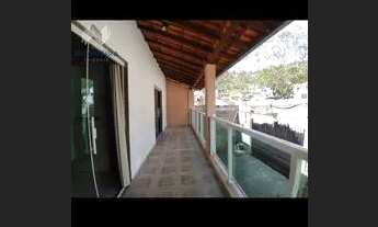 Imagem: Casa aconchegante num bairro residencial