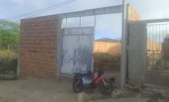 Imagem 6: Lote 6x24, todo murado, já tem alicerces feitos, encanação de esgoto feito, portão