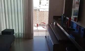 Imagem 2: Locação - Sala com sacada, cozinha planejada, área de serviço, 1 dormitório com armário em