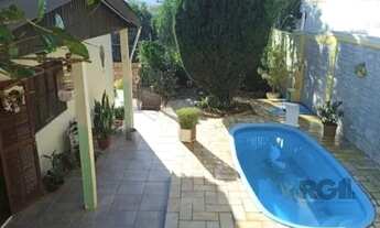 Imagem 4: Casas com total de 3 dormitórios, 2 banheiros, 2 vagas de garagem no Bairro Jardim Carvalh