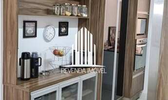 Imagem 3: Aconchegante apartamento com 3 quartos, sendo 1 suíte, e 3 banheiros no total. Este aparta