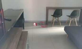 Imagem 3: Locação - Sala com sacada, cozinha planejada, área de serviço, 1 dormitório com armário em