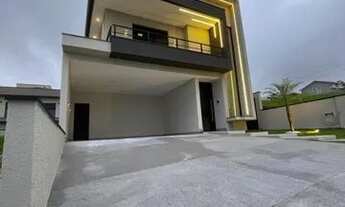 Imagem 2: Casa de alto padrão em condomínio, com 3 suítes e piscina