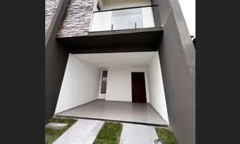 Imagem 2: Sobrado para venda possui 118 metros quadrados com 3 quartos em iririu - Joinville - Santa