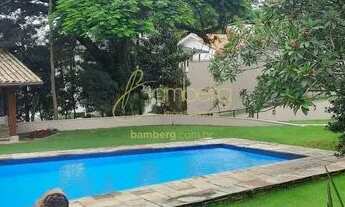 Imagem 2: Casa térrea com 1.454m² de terreno, muito verde em rua fechada