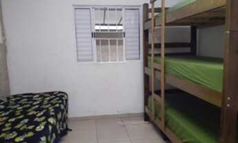 Imagem 6: Casa com churrasqueira, piscina aquecida em Praia Grande/SP