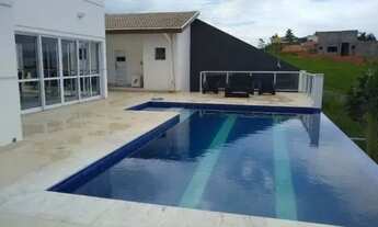 Imagem 2: Casa de condomínio para venda tem 317 metros quadrados com 3 quartos