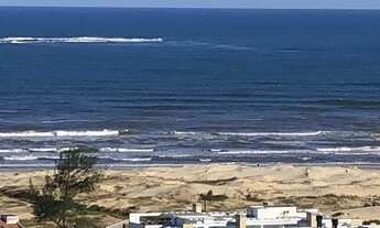 Imagem 2: Apartamento de três Suites, sala com pé direito duplo em Praia Grande - Torres - RS