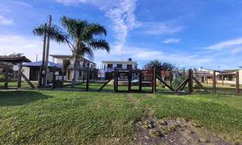 Imagem 2: Sobrado para venda tem 290 metros quadrados com 4 quartos em São Pedro - Arroio do Sal - R