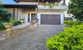 Imagem 2: Casa com 3 quartos, sendo 1 suite, no bairro Ideal em Novo Hamburgo