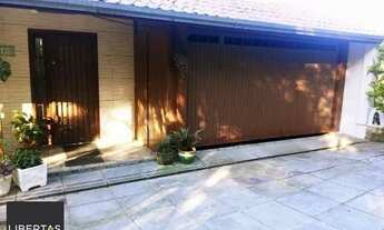 Imagem 3: Casa em Porto Alegre, no bairro Belém Novo, com 4 dormitório(s), e 4 banheiros