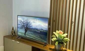 Imagem 2: Apartamento à venda com 67 m², suítes, sala de estar, cozinha, área de serviço e 2 vagas