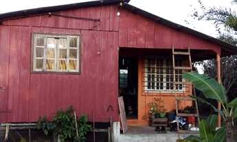 Imagem 2: Chácara com casa de madeira e banheiro de alvenaria em Paranaguá PR