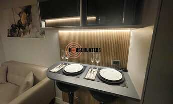 Imagem 3: Cozinha integrada Sala de estar com ar-condicionado 1 dormitório suíte com ar- condicionad