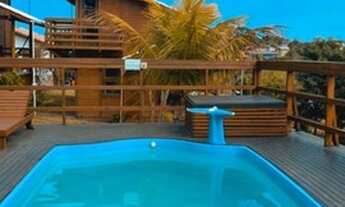 Imagem: Cabanas na Praia do Rosa