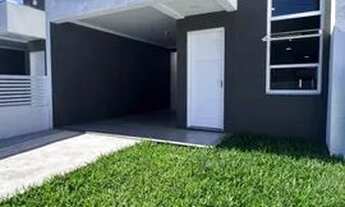 Imagem 2: Linda casa geminada em Capão Novo! Esta propriedade conta com 02 dormitórios, sendo 01 s