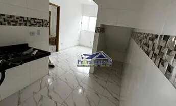 Imagem 3: Casa de condomínio térrea com quintal com 2 dormitórios, sala, cozinha, banheiro, lavabo