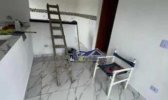 Imagem 5: Casa de condomínio térrea com quintal com 2 dormitórios, sala, cozinha, banheiro, lavabo