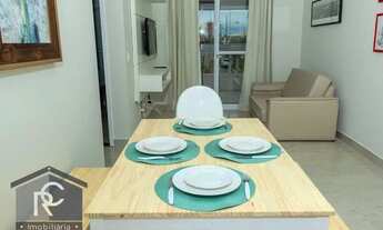 Imagem 5: Vendo apto com 2 dormitórios e 1 suíte com cozinha americana integrada com sala de 2 ambie