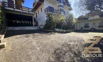 Imagem 6: Casa com 7 dormitórios à venda, 400 m² por R$ 980.000 - Vila Nova Suiça - Campos do Jordão