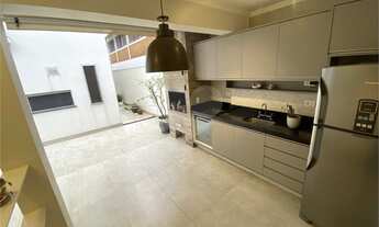 Imagem 4: Amplo Sobrado com 3 suítes, 5 banheiros, sala ampla, quintal com área gourmet, 2 vagas de