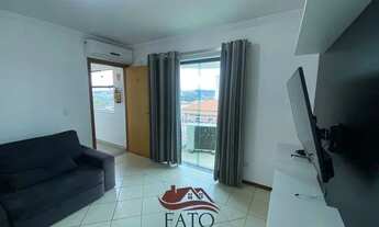 Imagem 7: Apartamento com móveis planejados, varanda e vaga coberta