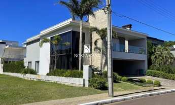 Imagem 6: Casa com 441m² e totalmente mobiliada com 5 dormitórios, todos com ar condicionado, sendo