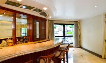 Imagem 2: 4 quartos, 2 suites, 4 vagas, 5 banheiros