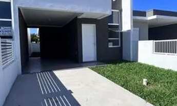 Imagem 1: Linda casa geminada em Capão Novo! Esta propriedade conta com 02 dormitórios, sendo 01 s