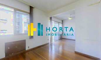 Imagem 4: Living com 3 ambientes divididos em sala de jantar, de estar e escritório, Uma suíte com s