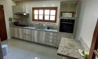 Imagem 6: Casa de condomínio para venda possui 190 metros quadrados com 4 quartos