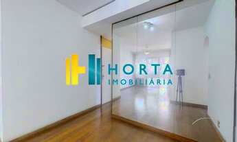 Imagem 6: Living com 3 ambientes divididos em sala de jantar, de estar e escritório, Uma suíte com s