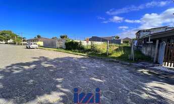 Imagem 2: Terreno na faixa do mar em rua pavimentada