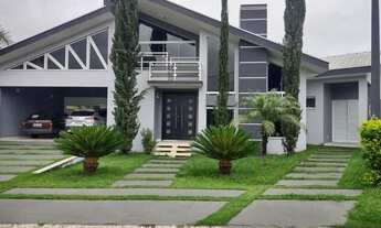 Imagem 2: Casa de Alto Padrão no Condomínio Jardim dos Lagos com 4 Suítes e Piscina Próxima ao Cent