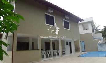 Imagem: À 450m da praia, 6 suítes climatizadas