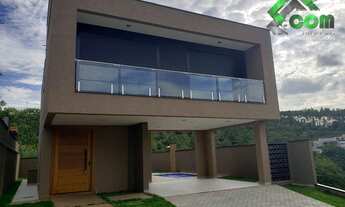 Imagem 2: Casa a venda em condomínio, 3 dormitórios, sendo 3 suítes , 4 banheiros, 4 vagas de garage