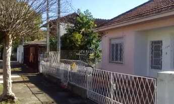 Imagem: Terreno com 3 casas e pátio no Cristo Redentor
