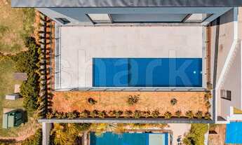 Imagem 7: Casa de condomínio para venda possui 350 metros quadrados com 5 quartos