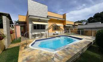 Imagem 2: Linda casa com 3 dormitórios, em frente à área verde no Ninho Verde 1, acesso de asfalto