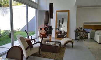 Imagem 4: Casa térrea em localização privilegiada, com lindo jardim churrasqueira, rua arborizada e