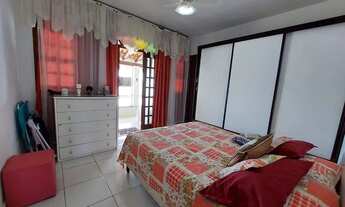 Imagem 7: CASA PÉ NA AREIA NA PRAIA DE SANTA MÔNICA COM DUAS ENTRADAS UMA EM RUA ASFALTADA E OUTRA N