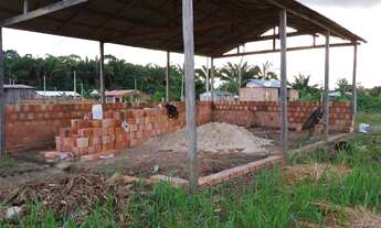 Imagem 2: Terreno com uma construção de uma casa