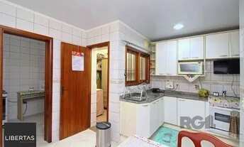 Imagem 4: Casa em Porto Alegre, no bairro Tristeza, com 3 dormitório(s), e 3 banheiros, à