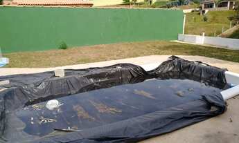 Imagem 6: Chácara para venda possui 200 metros quadrados com 2 quartos. Terreno com 750 metros